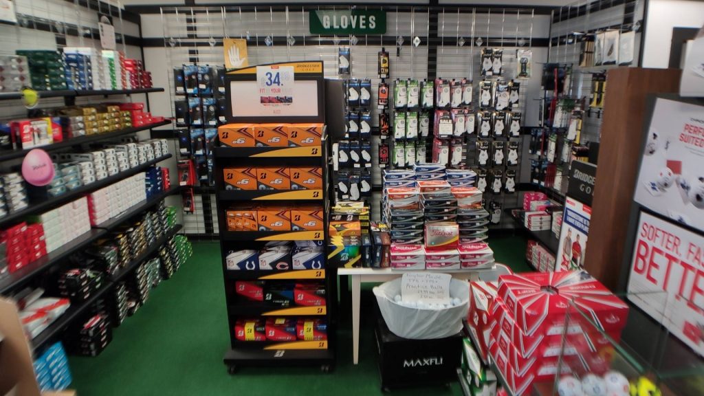 Golf balls and gloves at Howard's Golf